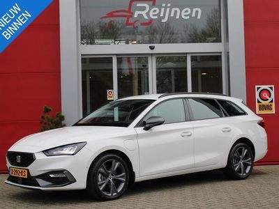 tweedehands Seat Leon Sportstourer 1.4 TSI 204PK PHEV AUTOMAAT FR BUSINESS INTENSE | NAVIGATIE | ACHTERUITRIJ CAMERA | APPLE CARPLAY / ANDROID AUTO | CLIMATE CONTROL | CRUISE CONTROL | STOEL / STUURVERWARMING | LED KOPLAMPEN | KEYLESS ENTRY / START | SEMI ELEKTRISCHE