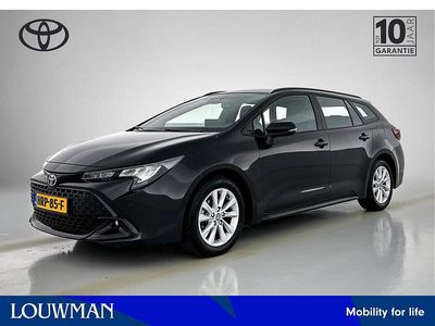 Zwart Gebruikt 2024 Toyota Corolla Hybrid Active Stationwagen | € 27.495