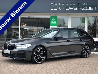Grijs Occasion 2020 BMW 518 Executive Stationwagen | € 31.500
