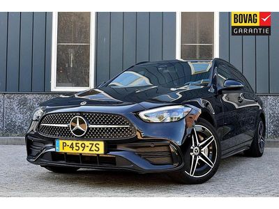 Zwart Occasion 2022 Mercedes C300 AMG line Stationwagen | € 38.950 (Iets duurder)