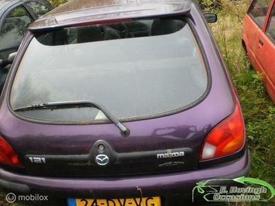 Occasion Mazda 121 60 PK (44 kW) 2000 Paars Hatchback
