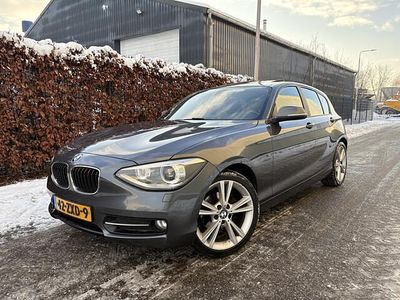 Grijs Occasion 2013 BMW 114 Sport Line Hatchback | € 6.450 (Eerlijke prijs)