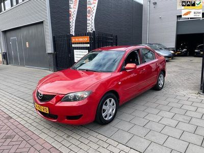 Rood, metallic lak Gebruikt 2004 Mazda 3 Touring Sedan | € 2.999 (Duur)