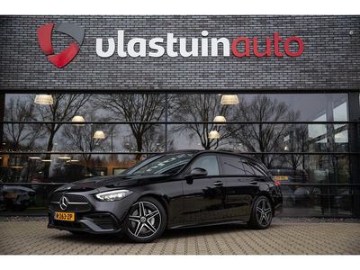 Zwart Occasion 2022 Mercedes C200 AMG line Stationwagen | € 38.950 (Duur)