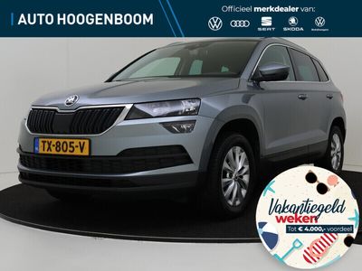 tweedehands Skoda Karoq 1.0 TSI Clever Edition | Stoelverwarming | Navigatie | Achteruitrijcamera | Climate control | Cruise control | Parkeersensoren | Draadloze telefoonlader |