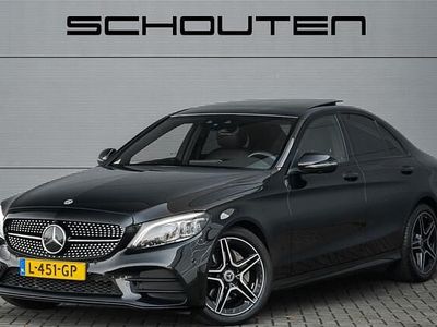 Zwart (metallic) Gebruikt 2021 Mercedes C180 AMG Sedan | € 32.900 (Super prijs)
