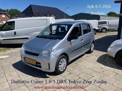 Occasion Daihatsu Cuore 58 PK (42 kW) 2005 Grijs (metallic) Hatchback