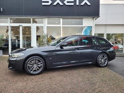 Zwart Gebruikt 2023 BMW 520 M Sport Stationwagen | € 39.950