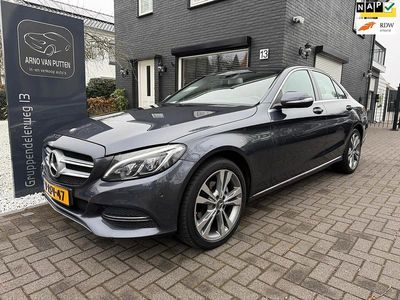 Grijs (metallic) Occasion 2014 Mercedes C180 Sedan | € 13.800