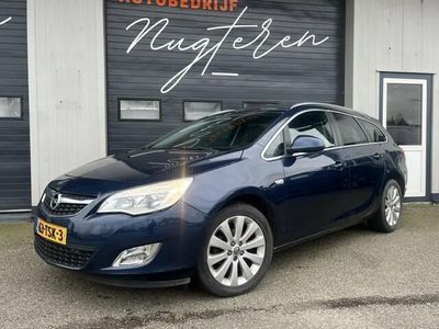 Occasion Opel Astra Cosmo 120 PK (88 kW) 2012 Blauw, metallic lak Stationwagen