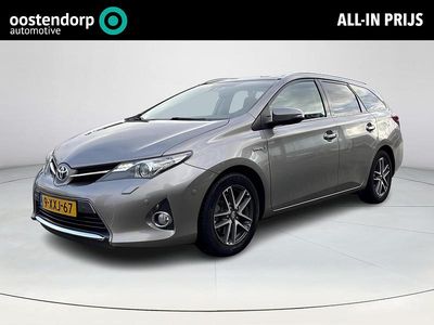 Bruin Occasion 2014 Toyota Auris Hybrid Stationwagen | € 11.945 (Eerlijke prijs)