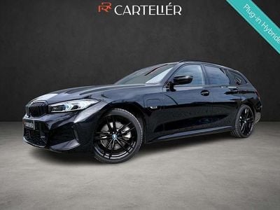 Zwart Gebruikt 2022 BMW 330e M Sport Stationwagen | € 34.695 (Eerlijke prijs)