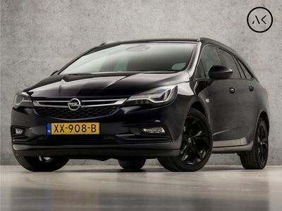 tweedehands Opel Astra Sports Tourer 1.0 Black Sport (APPLE CARPLAY, NAVIGATIE, CLIMATE, CAMERA, LEDER, SPORTSTOELEN, GETINT GLAS, ADAPTIVE CRUISE, LED KOPLAMPEN, ZWART HEMEL, ELEK ACHTERKLEP, NIEUWSTAAT)