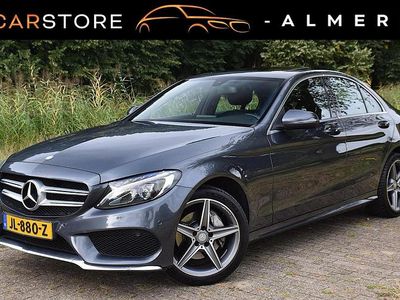 Grijs Occasion 2015 Mercedes C200 Prestige Sedan | € 12.750 (Goede deal)
