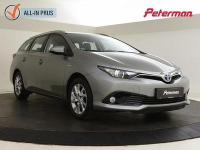 Grijs (metallic) Occasion 2015 Toyota Auris Touring Sports Stationwagen | € 14.899 (Eerlijke prijs)
