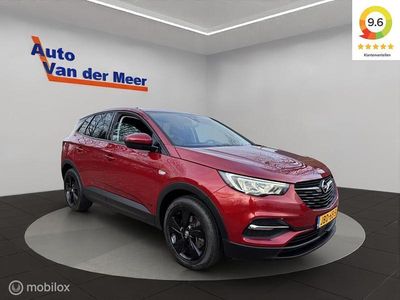 Rood, metallic lak Gebruikt 2021 Opel Grandland X Business Edition SUV | € 23.440 (Eerlijke prijs)