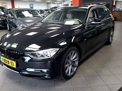 Zwart Occasion 2014 BMW 316 Executive Stationwagen | € 9.850 (Eerlijke prijs)