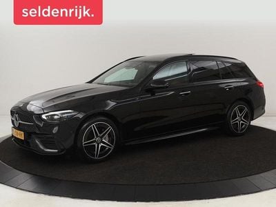 Zwart Occasion 2022 Mercedes C300e AMG line Stationwagen | € 31.400 (Eerlijke prijs)
