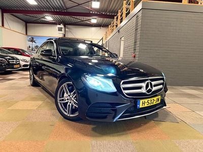 Zwart (metallic) Occasion 2019 Mercedes E220 AMG line Sedan | € 18.750 (Goede deal)