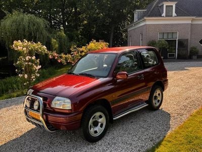 Occasion Suzuki Grand Vitara 132 PK (97 kW) 2000 Rood, metallic lak SUV