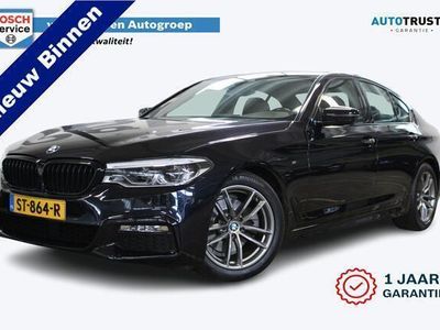 tweedehands BMW 520 5-SERIE i High Executive M-Pakket | Incl. 1 jaar Garantie | Clima | Stoelverwarming | Dealer onderhouden! | Navi | Cruise | Keyless start | Elektrisch verstelbare stoelen | Vol Leder memory sportstoelen | Lederen bekleding | 18 Inch LMV | Adaptive