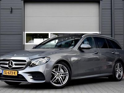 tweedehands Mercedes 200 E-KLASSE EstateAMG Line | Panoramadak | Trekhaak Wegkl. | Apple CarPlay/Android | Sfeerverlichting | Camera | Widescreen Cockpit | 19'' Velgen | Full-LED | NL-Auto |