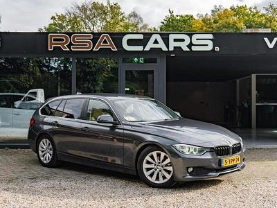 Grijs Occasion 2014 BMW 316 Executive Stationwagen | € 9.500 (Goede deal)