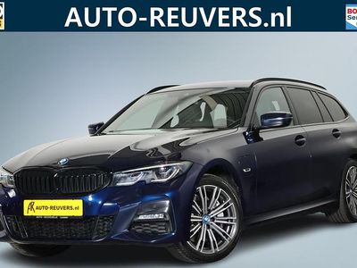 Blauw (metallic) Gebruikt 2022 BMW 330e M Sport Stationwagen | € 33.900 (Eerlijke prijs)