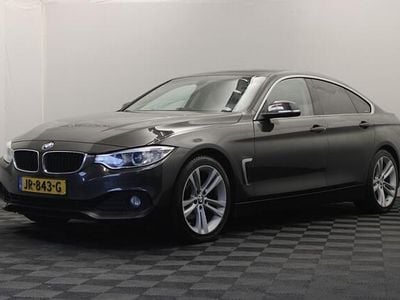 Bruin (metallic) Occasion 2016 BMW 418 Executive Coupé | € 10.999