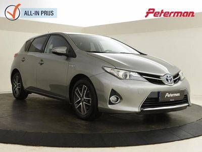 Grijs (metallic) Gebruikt 2014 Toyota Auris Hybrid Active Hatchback | € 14.199 (Eerlijke prijs)