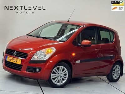 Oranje (metallic) Gebruikt 2011 Suzuki Splash Exclusive Hatchback | € 6.850 (Eerlijke prijs)