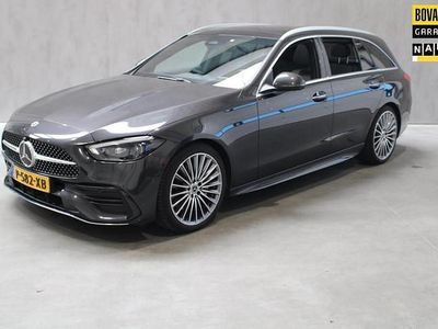 Grijs Occasion 2022 Mercedes C200 AMG line Stationwagen | € 43.495 (Duur)
