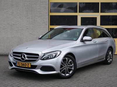 tweedehands Mercedes 180 C-KLASSE EstateAutomaat! Business Solution BJ2018 Lmv 17" | Led | Pdc | Navi | Achteruitrijcamera | Climate control | Cruise control | A-Klep Elek. | Elek. voorstoelen | Verwarmde voorstoelen | Getint glas