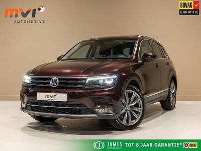 Rood (metallic) Occasion 2017 VW Tiguan Highline SUV | € 27.000 (Iets duurder)