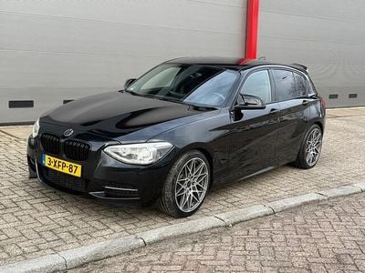 Zwart Occasion 2014 BMW 116 Executive Hatchback | € 7.249 (Goede deal)