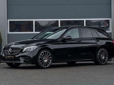 Zwart Gebruikt 2020 Mercedes C300e AMG Stationwagen | € 28.950 (Iets duurder)
