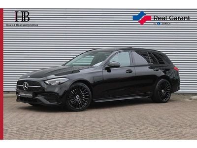 Occasion Mercedes C300 AMG line 204 PK (150 kW) 2022 Zwart Stationwagen