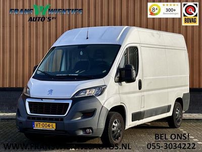 tweedehands Peugeot Boxer 330 2.2 HDI L2H2 Première | EX BTW | Achterruitrijcamera | Cruise Control | Parkeersensoren Achter | Navigatie | Bluetooth | Wandbetimmering | Airconditioning |