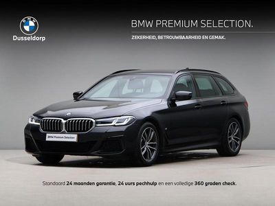 Zwart Occasion 2022 BMW 520 Stationwagen | € 38.450 (Duur)