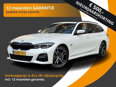 Wit Occasion 2022 BMW 320e Executive Stationwagen | € 28.650 (Iets duurder)