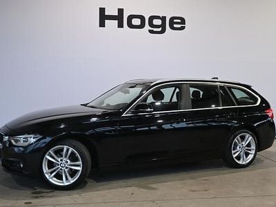 Zwart (metallic) Gebruikt 2017 BMW 318 Executive Stationwagen | € 10.940 (Eerlijke prijs)
