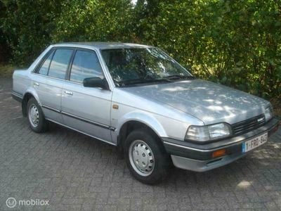 Occasion Mazda 323 75 PK (55 kW) 1988 Grijs Sedan