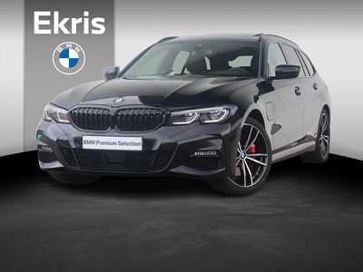 Zwart Occasion 2021 BMW 320e Executive Stationwagen | € 34.900 (Duur)