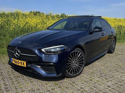 Blauw Occasion 2022 Mercedes C200 AMG line Sedan | € 40.995 (Eerlijke prijs)