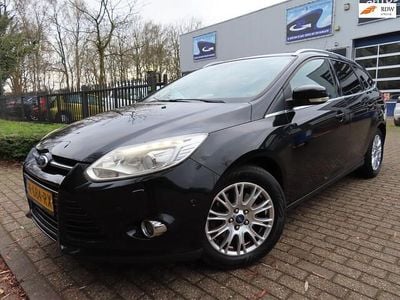 Zwart (metallic) Gebruikt 2011 Ford Focus Titanium Stationwagen | € 5.750 (Eerlijke prijs)