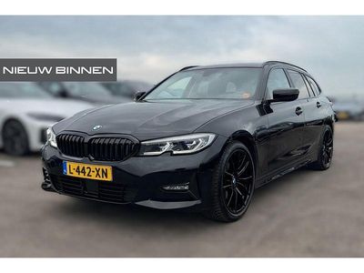 Zwart Occasion 2021 BMW 320 Stationwagen | € 28.740 (Iets duurder)