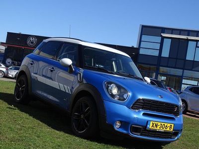 tweedehands Mini Cooper S Countryman 1.6 5-persoons ALL4 184 pk Chili - Automaat, Pano dak, Xenon, Automatische airco, Sportstoelen, Leder interieur, Stoelverwarming, Sportstuur met schakelflippers, Lichtmetalen velgen, Dakrail, Armsteun voor