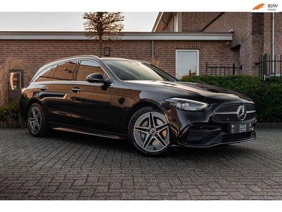 Zwart Occasion 2022 Mercedes C300e AMG line Stationwagen | € 31.450 (Eerlijke prijs)