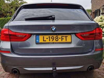 Grijs Occasion 2018 BMW 520 Executive Stationwagen | € 25.750