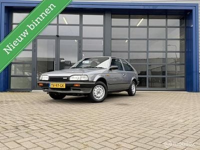 Grijs Gebruikt 1989 Mazda 323 Hatchback | € 3.990